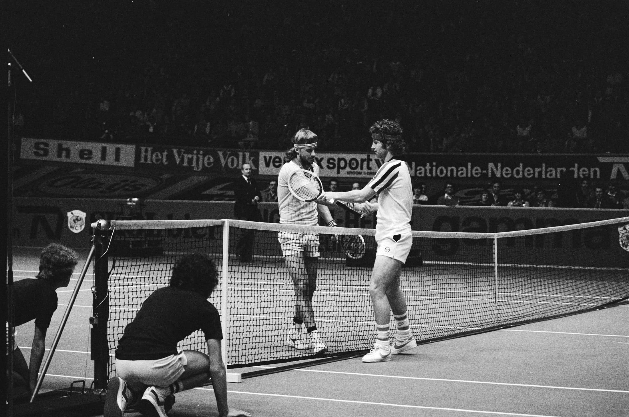Björn Borg and John McEnroe shaking hands at the net after a match