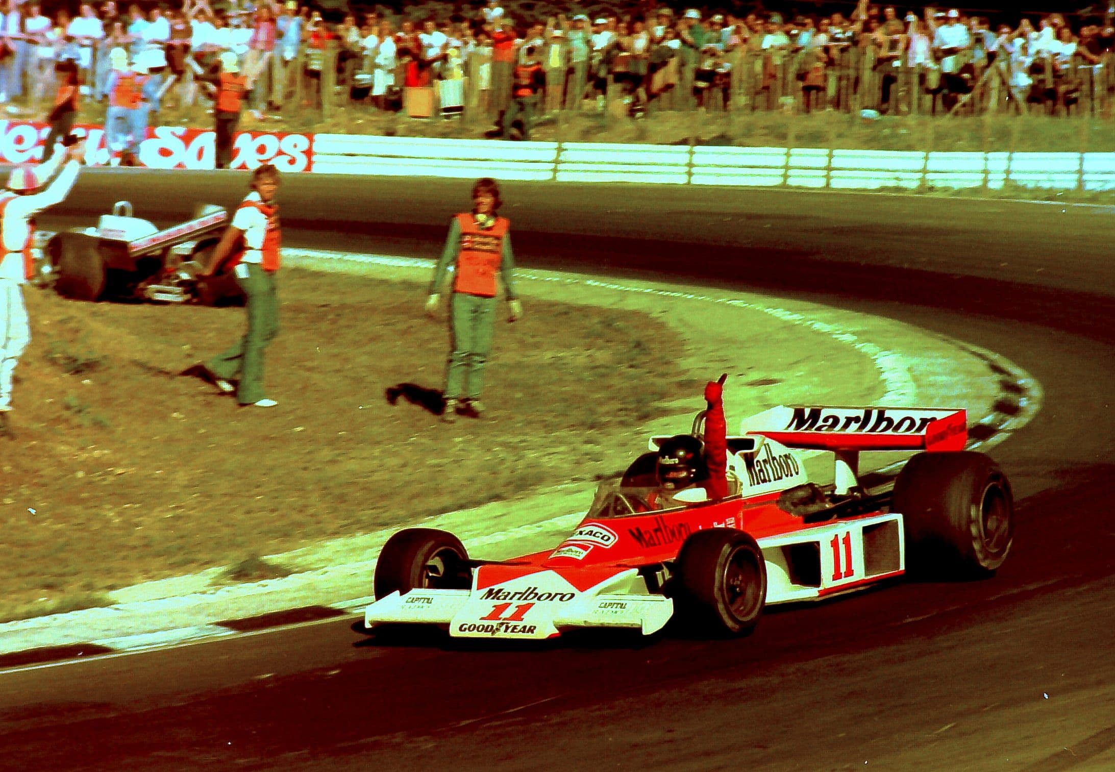 James Hunt celebrating from his McLaren cockpit, 1976 season